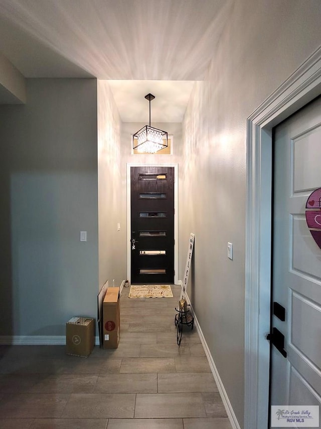 doorway to outside featuring hardwood / wood-style floors