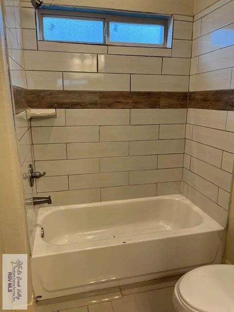 1972 Baja Dr Unit 4, Los Fresnos, TX 78566 - full bathroom with healthy amount of natural light, toilet, and  shower combination