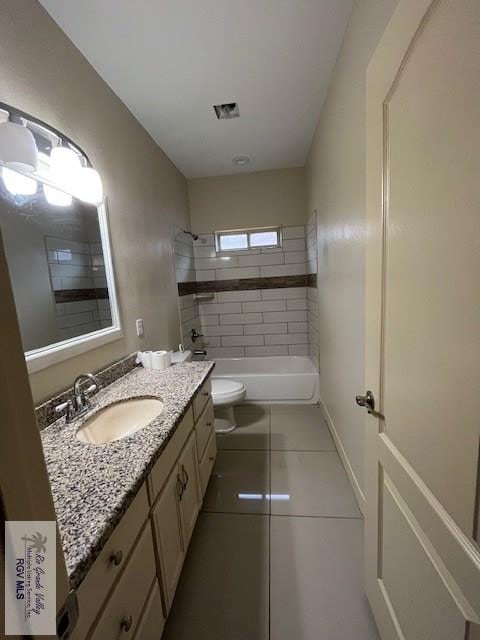 1972 Baja Dr Unit 4, Los Fresnos, TX 78566 - bathroom with toilet, tile patterned flooring, vanity, and  shower combination