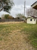 view of yard with a shed