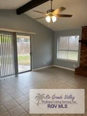 unfurnished living room with vaulted ceiling with beams, tile patterned floors, and ceiling fan