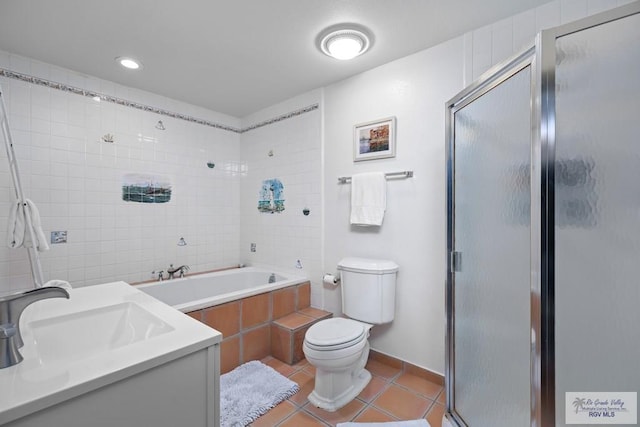 131 Windward Dr, Port Isabel, TX 78578 - full bath with toilet, a sink, a washtub, a shower stall, and tile patterned floors