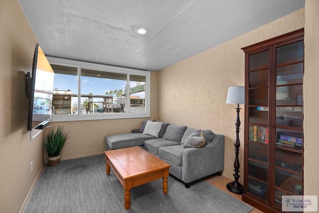 131 Windward Dr, Port Isabel, TX 78578 - living room featuring a textured wall