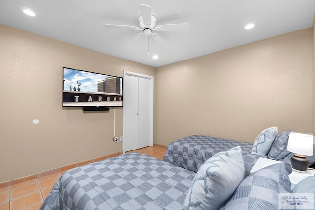 131 Windward Dr, Port Isabel, TX 78578 - bedroom featuring light tile patterned flooring, ceiling fan, and recessed lighting