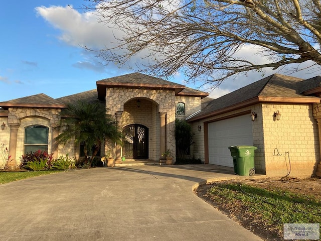 view of front of property featuring a garage