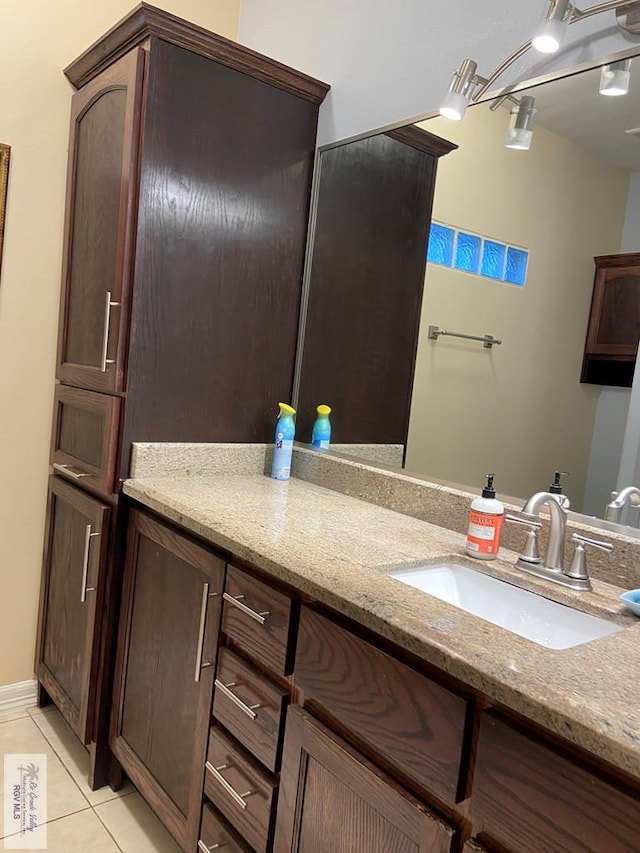 bathroom featuring vanity and tile patterned floors