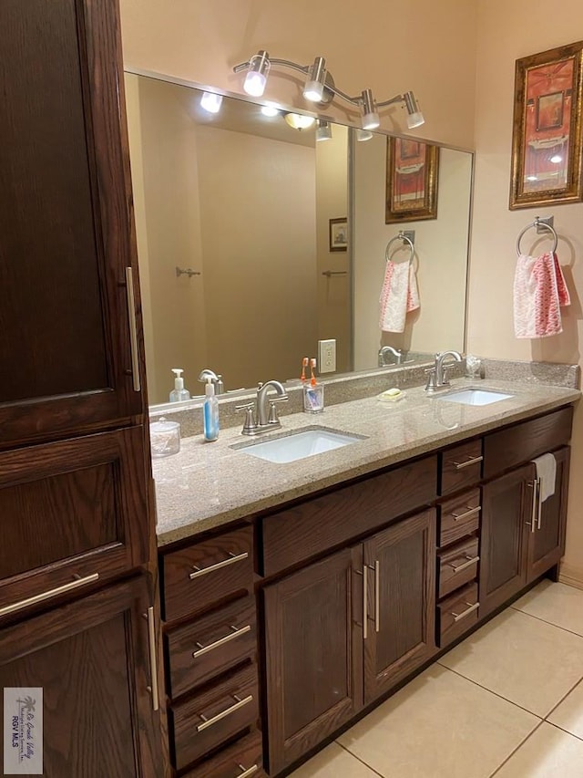 bathroom with vanity and tile patterned floors