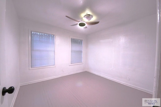 empty room featuring ceiling fan