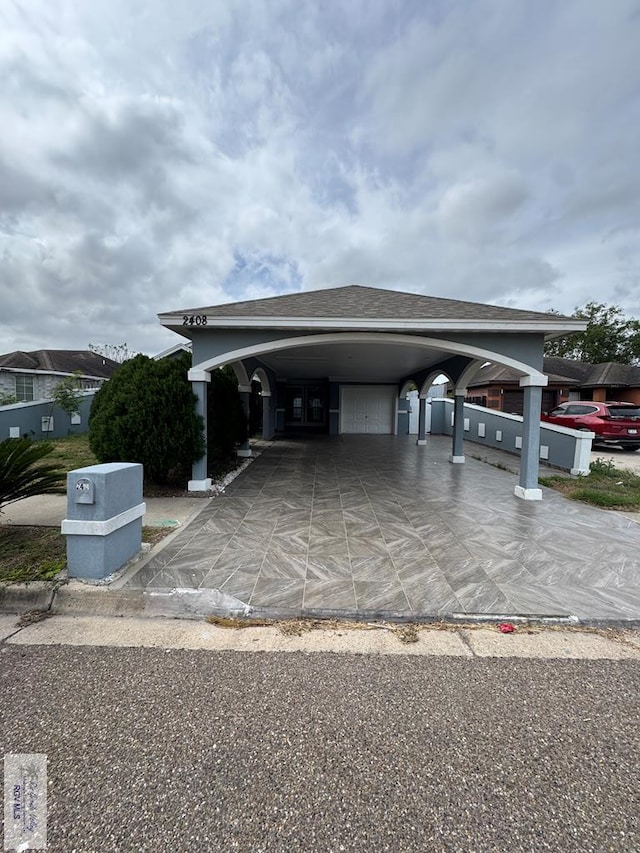 view of car parking with an attached carport