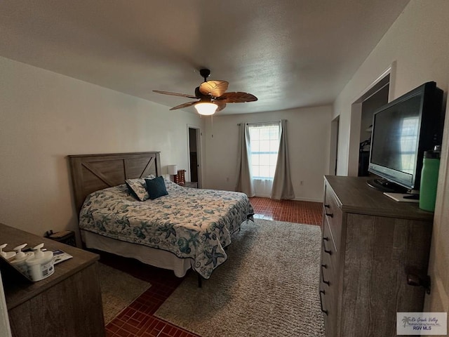 bedroom featuring ceiling fan