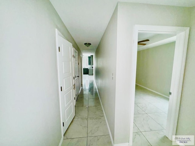 43 El Paso Rd, Brownsville, TX 78520 - hall featuring baseboards and marble finish floor