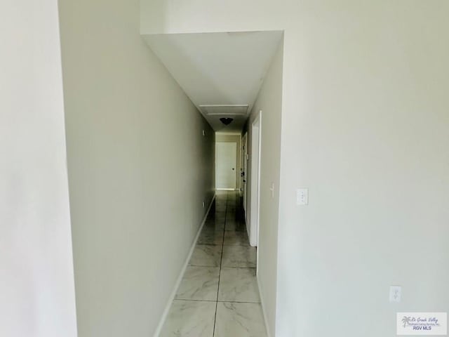 43 El Paso Rd, Brownsville, TX 78520 - corridor featuring baseboards and marble finish floor