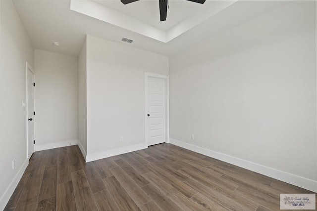 25219 Chelsea Ln, Harlingen, TX 78552 - unfurnished room with wood finished floors, ceiling fan, and baseboards