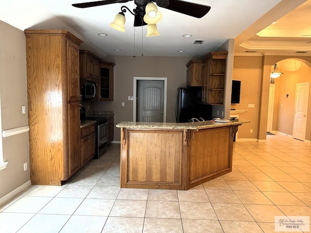 kitchen with light tile patterned flooring, a breakfast bar, ceiling fan, kitchen peninsula, and stainless steel appliances