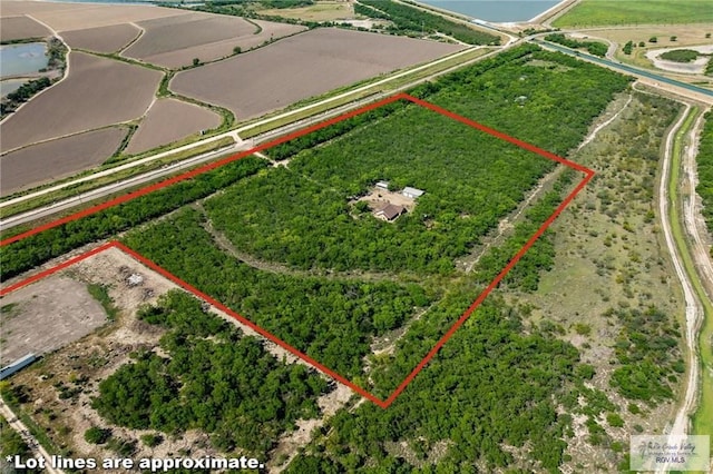 birds eye view of property featuring a rural view