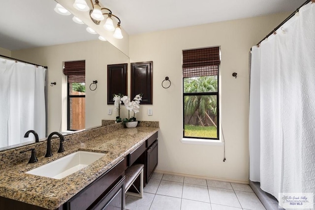 5 Mantua St, Brownsville, TX 78526 - full bathroom featuring healthy amount of natural light, vanity, and tile patterned flooring
