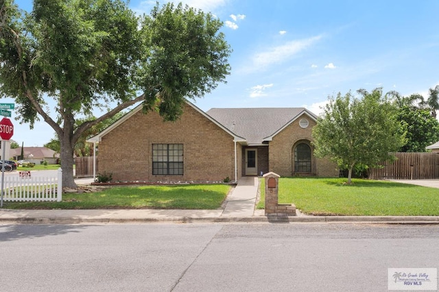 5 Mantua St, Brownsville, TX 78526 - view of front of house with brick siding