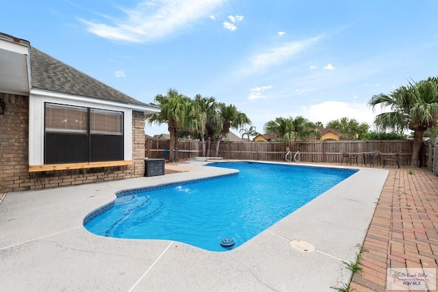 5 Mantua St, Brownsville, TX 78526 - view of swimming pool featuring a patio area and a fenced backyard