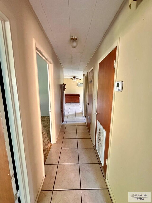 697 W White Ave, Raymondville, TX 78580 - hallway with light tile patterned floors and visible vents