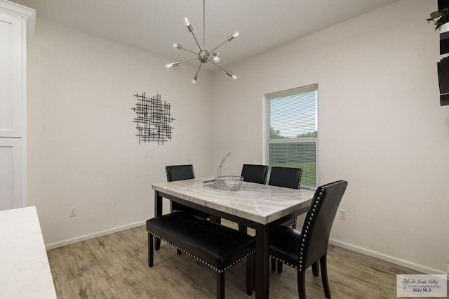 3214 W Hapner St, Harlingen, TX 78550 - dining area with a chandelier and light wood finished floors
