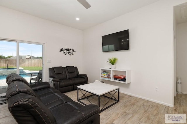 3214 W Hapner St, Harlingen, TX 78550 - living room featuring light wood-style flooring, a ceiling fan, and recessed lighting