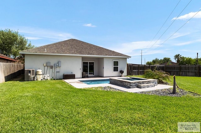 3214 W Hapner St, Harlingen, TX 78550 - back of house featuring stucco siding, a fenced backyard, a shingled roof, and a patio