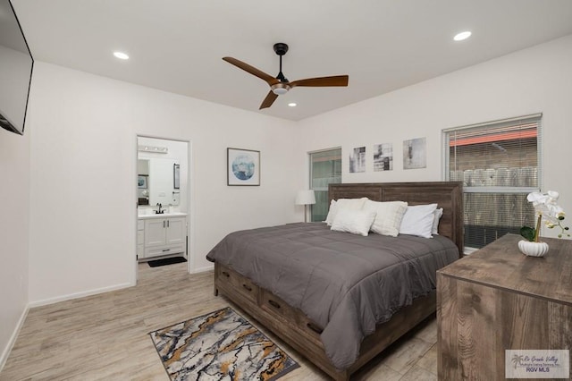 3214 W Hapner St, Harlingen, TX 78550 - bedroom with light wood finished floors, ensuite bathroom, recessed lighting, and a ceiling fan