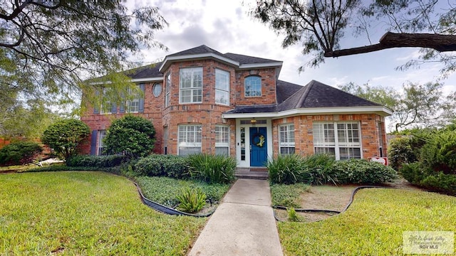 view of front of home with a front yard