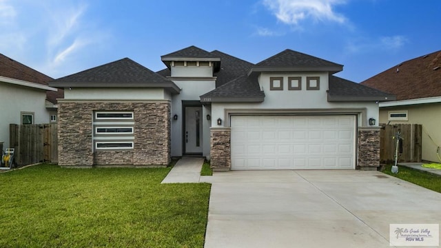 prairie-style house with stone siding, fence, and stucco siding