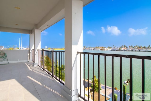 balcony featuring a water view