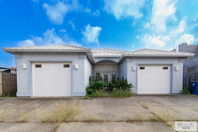 ranch-style home with a garage