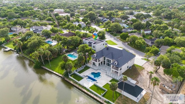 bird's eye view with a water view