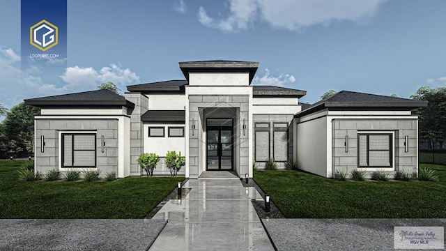 view of front facade with a front yard and stucco siding
