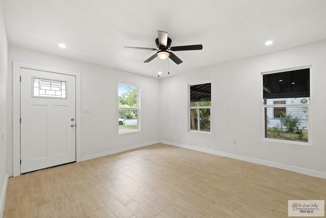 1522 Ball St, Harlingen, TX 78550 - entrance foyer with a ceiling fan, light wood-type flooring, and recessed lighting