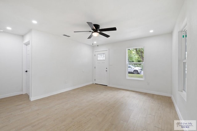 1522 Ball St, Harlingen, TX 78550 - unfurnished room featuring a ceiling fan, light wood finished floors, and recessed lighting