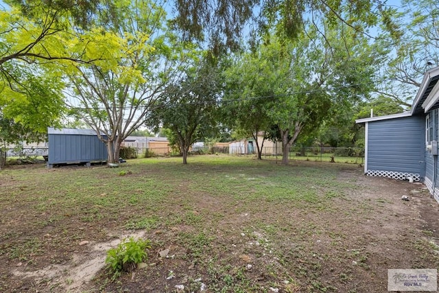 1522 Ball St, Harlingen, TX 78550 - view of yard with a storage unit