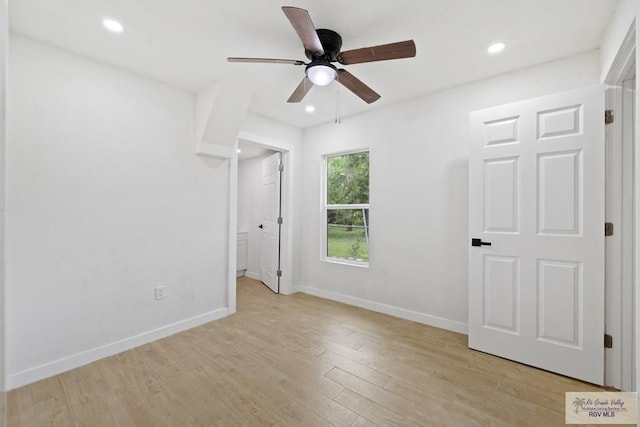 1522 Ball St, Harlingen, TX 78550 - unfurnished bedroom featuring recessed lighting, light wood finished floors, and a ceiling fan
