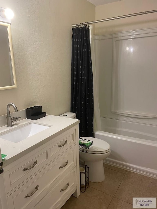 2402 Ed Carey Dr Unit 33, Harlingen, TX 78550 - full bath with vanity, shower / bath combo, and tile patterned floors