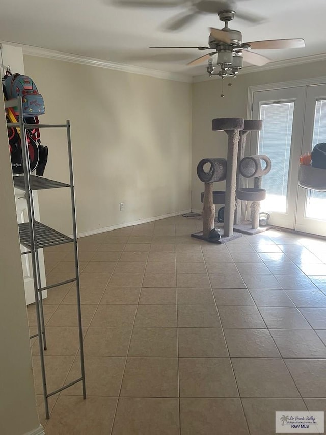 2402 Ed Carey Dr Unit 33, Harlingen, TX 78550 - workout room featuring tile patterned floors, a ceiling fan, ornamental molding, and french doors
