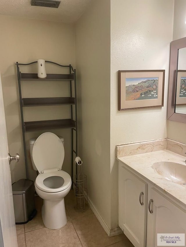 2402 Ed Carey Dr Unit 33, Harlingen, TX 78550 - bathroom featuring vanity and tile patterned flooring