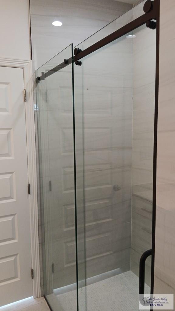 bathroom featuring walk in shower