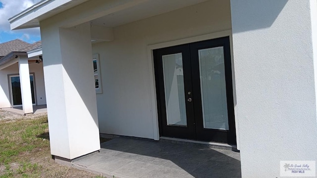 doorway to property with french doors