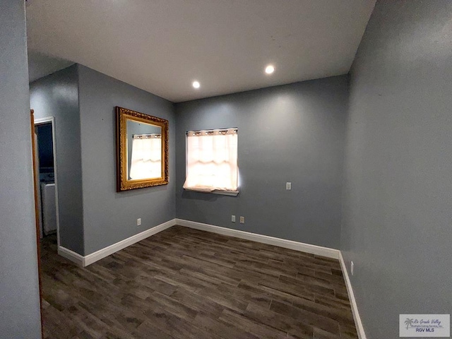 201 Terrace Ln, Harlingen, TX 78550 - empty room featuring dark wood-style flooring, baseboards, and recessed lighting