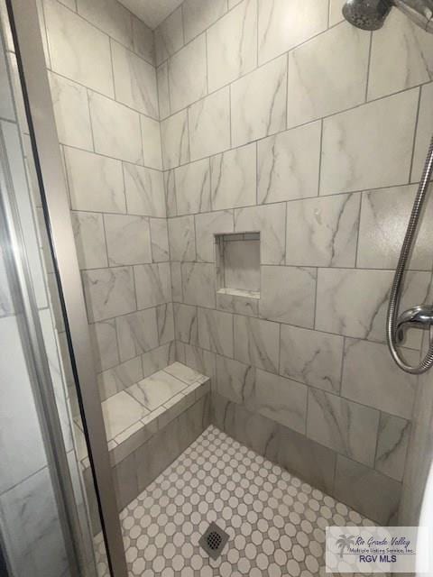 201 Terrace Ln, Harlingen, TX 78550 - full bathroom featuring tiled shower