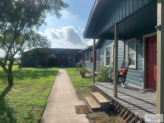 view of yard featuring a porch