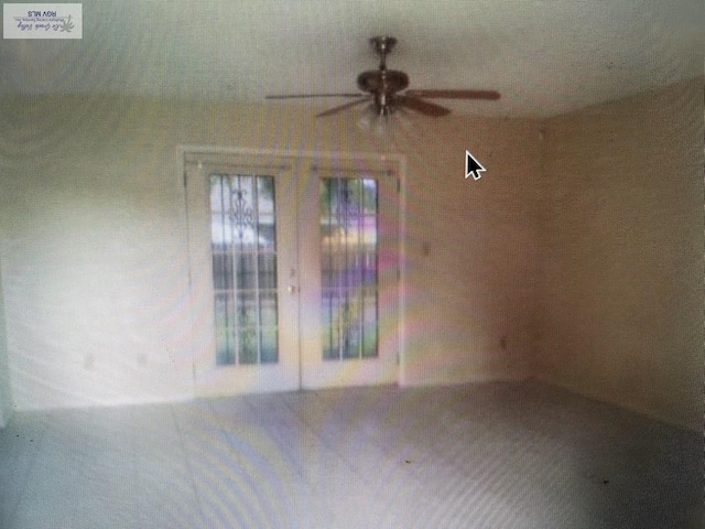 unfurnished room featuring ceiling fan