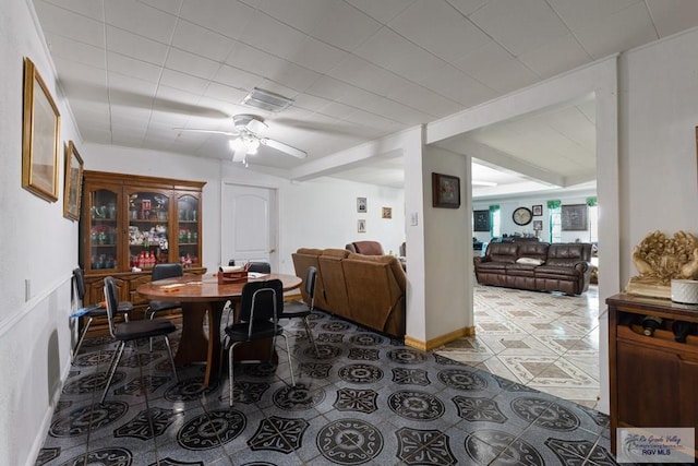 dining area featuring ceiling fan, tile patterned floors, and visible vents