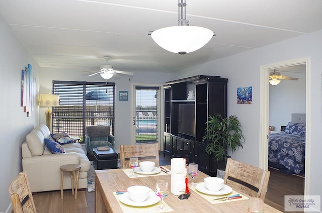 dining room featuring dark hardwood / wood-style floors and ceiling fan