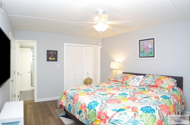 bedroom with dark wood-type flooring, ceiling fan, connected bathroom, and a closet