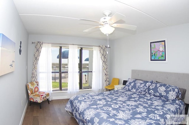 bedroom with ceiling fan, dark hardwood / wood-style flooring, and access to outside